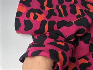 Fastvævet viscose - skøn leo i mørk pink